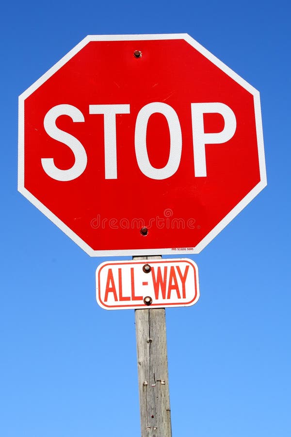 Stop sign against blue background. Stop sign against blue background.
