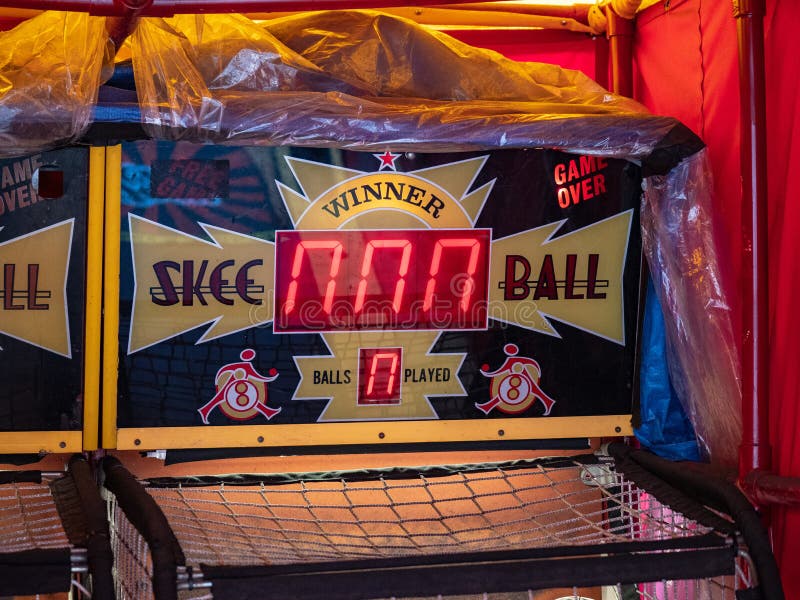 Skee ball arcade game station wrapped in a plastic sitting in storage. Skee ball arcade game station wrapped in a plastic sitting in storage