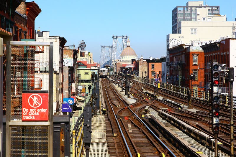 The train is coming at Marcy Avenue station in Williamsburg, New York. The train is coming at Marcy Avenue station in Williamsburg, New York