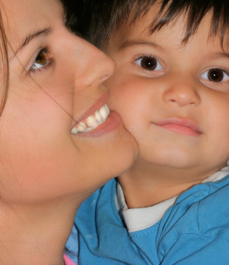 Profile of a woman and the face of her little boy. Profile of a woman and the face of her little boy.