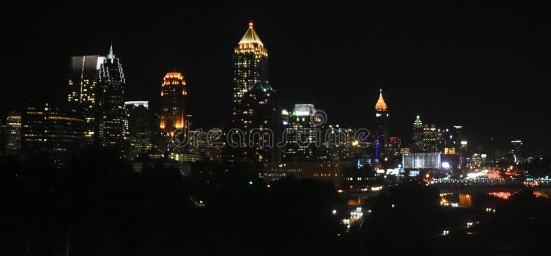The Atlanta, GA skyline at night. The Atlanta, GA skyline at night.