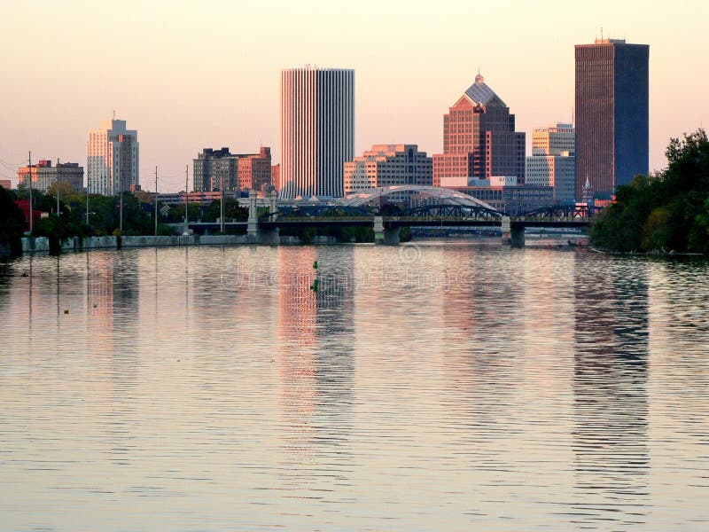 Rochester downtown and the Genesee river by sunset. Rochester downtown and the Genesee river by sunset