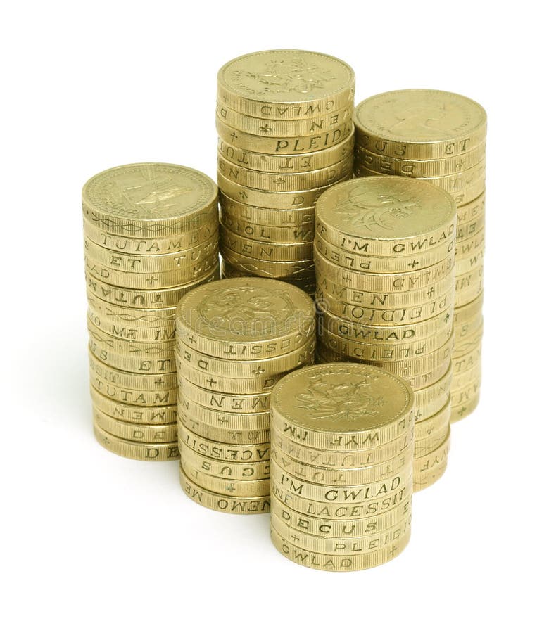 Stacked English pound coins on a white background. Stacked English pound coins on a white background