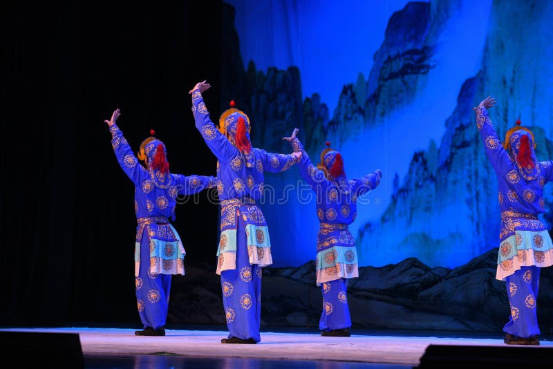 This opera tells a patriotic story how does an old woman of a hundred years old go out for a battle with the twelve women generals of Yang family herself. During the period of Renzong in Song Dynasty, the king of Western Xia invaded its border region, the Song Dynasty’s supreme commander Yang Zongbao fought against the enemies bravely with his army, but unfortunately, he died in the battle by an arrow shot from hiding. Meanwhile, She Taijun of one hundred years old in Yang family was giving a banquet to celebrate her grandson Zongbao’s fiftieth birthday. Everyone in the family was grieved deeply when the tragic news came. When She Taijun heard that the royal court was going to cede territories for peace, she suppressed her grief, refuted the fallacy sternly, and decided to go for the battle herself with the women generals of the Yang family. The great-grandson Yang Wenguang wanted to go with them, his grandmother Princess Chai didn’t let him go in consideration of perpetuating the Yang line. She Taijun told him that he could challenge martial art skills with his mother Mu Guiying to prove whether he can go or not. With his mother’s pretending to fail by his spear skill and the help of Du Jine, the wife of Yang Yansi, Yang Wenguang got his wish. After being defeated utterly, the king of Western Xia intended to capture Yang The Beijing Opera Women Generals of Yang Family was performed in Jiangxi Art Center by The Beijing Opera Troupe of Fujian Province. This opera tells a patriotic story how does an old woman of a hundred years old go out for a battle with the twelve women generals of Yang family herself. During the period of Renzong in Song Dynasty, the king of Western Xia invaded its border region, the Song Dynasty’s supreme commander Yang Zongbao fought against the enemies bravely with his army, but unfortunately, he died in the battle by an arrow shot from hiding. Meanwhile, She Taijun of one hundred years old in Yang family was giving a banquet to celebrate her grandson Zongbao’s fiftieth birthday. Everyone in the family was grieved deeply when the tragic news came. When She Taijun heard that the royal court was going to cede territories for peace, she suppressed her grief, refuted the fallacy sternly, and decided to go for the battle herself with the women generals of the Yang family. The great-grandson Yang Wenguang wanted to go with them, his grandmother Princess Chai didn’t let him go in consideration of perpetuating the Yang line. She Taijun told him that he could challenge martial art skills with his mother Mu Guiying to prove whether he can go or not. With his mother’s pretending to fail by his spear skill and the help of Du Jine, the wife of Yang Yansi, Yang Wenguang got his wish. After being defeated utterly, the king of Western Xia intended to capture Yang The Beijing Opera Women Generals of Yang Family was performed in Jiangxi Art Center by The Beijing Opera Troupe of Fujian Province.