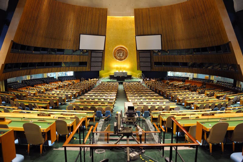 NEW YORK CITY, NY, USA - MAR 30: The General Assembly Hall is the largest room in the United Nations with seating capacity for over 1,800 people. March 30, 2011 in Manhattan, New York City. NEW YORK CITY, NY, USA - MAR 30: The General Assembly Hall is the largest room in the United Nations with seating capacity for over 1,800 people. March 30, 2011 in Manhattan, New York City.