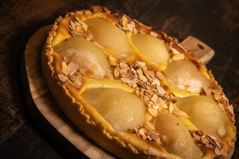 Bourdaloue tart recipe with pears, custard and almond cream. High quality photo. Bourdaloue tart recipe with pears, custard and almond cream. High quality photo