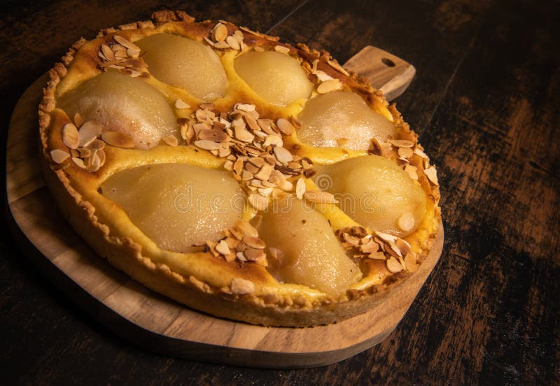 Bourdaloue tart recipe with pears, custard and almond cream. High quality photo. Bourdaloue tart recipe with pears, custard and almond cream. High quality photo