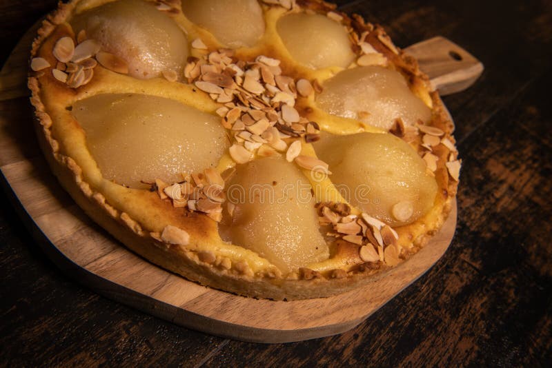 Bourdaloue tart recipe with pears, custard and almond cream. High quality photo. Bourdaloue tart recipe with pears, custard and almond cream. High quality photo