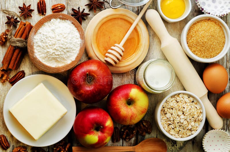 Ingredients for baking: apples, nuts, honey, flour and butter. toning. selective focus. Ingredients for baking: apples, nuts, honey, flour and butter. toning. selective focus