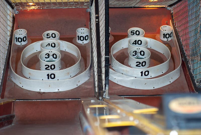 Two Skee ball machines at an amusement part. Two Skee ball machines at an amusement part