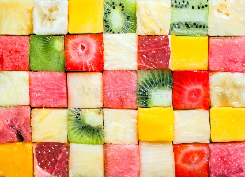 Seamless background pattern and texture of colourful fresh diced tropical fruit cubes arranged in a geometric pattern with melon, watermelon, banana, pineapple, strawberry, kiwifruit and grapefruit. Seamless background pattern and texture of colourful fresh diced tropical fruit cubes arranged in a geometric pattern with melon, watermelon, banana, pineapple, strawberry, kiwifruit and grapefruit