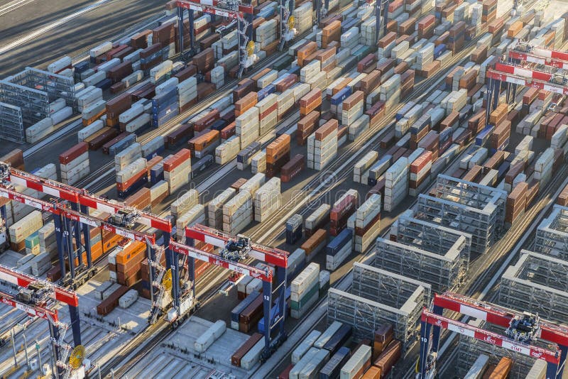Los Angeles, California, USA - August 16, 2016: Afternoon aerial view of stacks of port side shipping containers. Los Angeles, California, USA - August 16, 2016: Afternoon aerial view of stacks of port side shipping containers.
