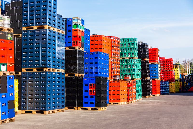 Several stacks of colorful beverage bottle crates outdoors. Several stacks of colorful beverage bottle crates outdoors