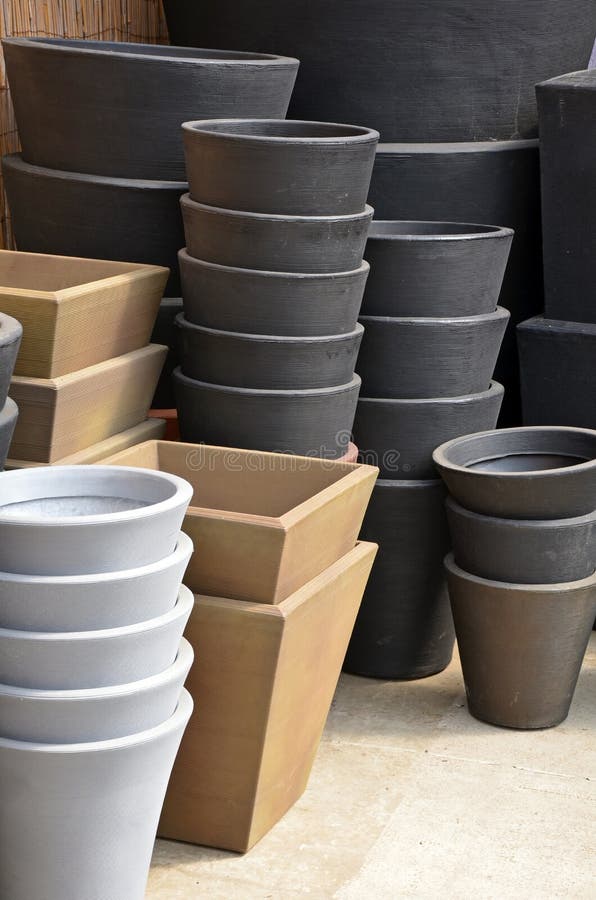 Stacks of assorted planters in garden shop. Stacks of assorted planters in garden shop