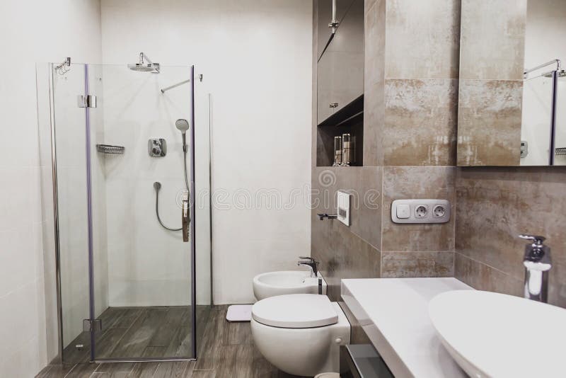 Modern bathroom in white and gray tones with mosaic on wide angle view. Real estate concept. Modern bathroom in white and gray tones with mosaic on wide angle view. Real estate concept.