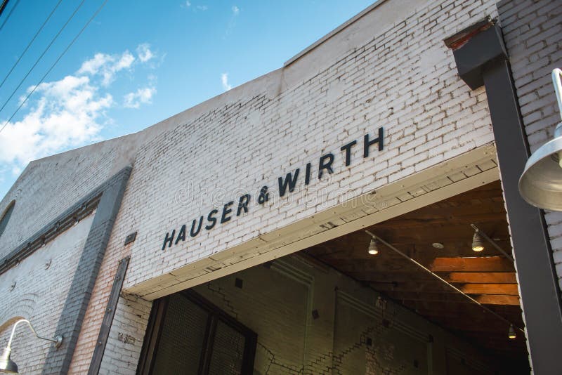 A building sign for the upscale gallery community building known as Hauser and Wirth, located in the Arts District in downtown Los Angeles, California. A building sign for the upscale gallery community building known as Hauser and Wirth, located in the Arts District in downtown Los Angeles, California.