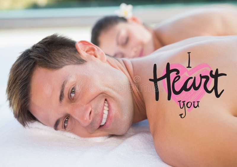 Σύνθετη εικόνα του ατόμου στη SPA με το κείμενο βαλεντίνων στοκ εικόνες