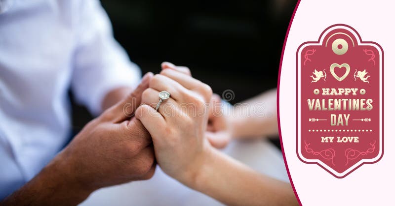 Σύνθετη εικόνα του ζεύγους με το δαχτυλίδι αρραβώνων στοκ φωτογραφία