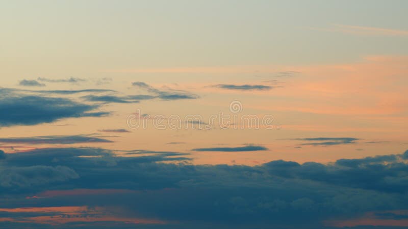 Timelapse. Morning clouds. Colorful clouds at sunrise. Skyscrapers with blue sky clouds. Timelapse. Morning clouds. Colorful clouds at sunrise. Skyscrapers with blue sky clouds.