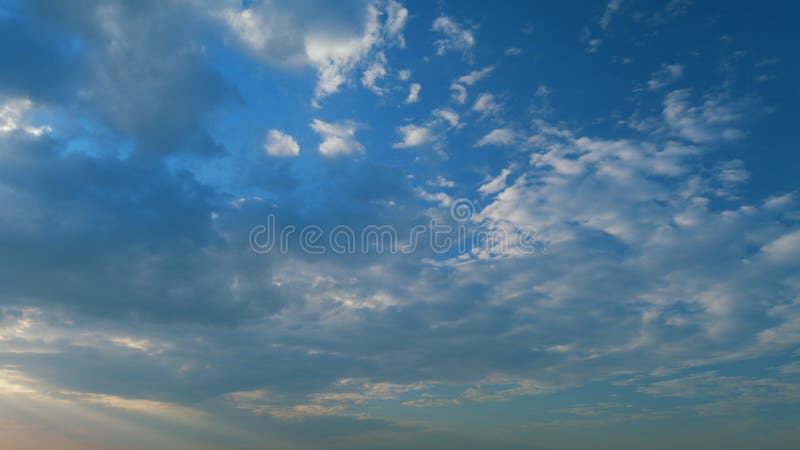 Timelapse. Cirrocumulus cloud in evening. Beautiful and relaxing clouds with a dark blue afternoon sky. Timelapse. Cirrocumulus cloud in evening. Beautiful and relaxing clouds with a dark blue afternoon sky.