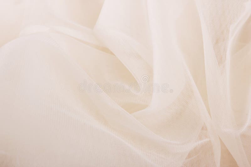 Ivory chiffon tulle fabric textured background. pleated skirt fabric texture. closeup plisse fabric texture pattern. Ivory chiffon tulle fabric textured background. pleated skirt fabric texture. closeup plisse fabric texture pattern