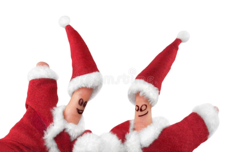 Fingers dressed in Santa-Claus red-white costumes. Fingers dressed in Santa-Claus red-white costumes