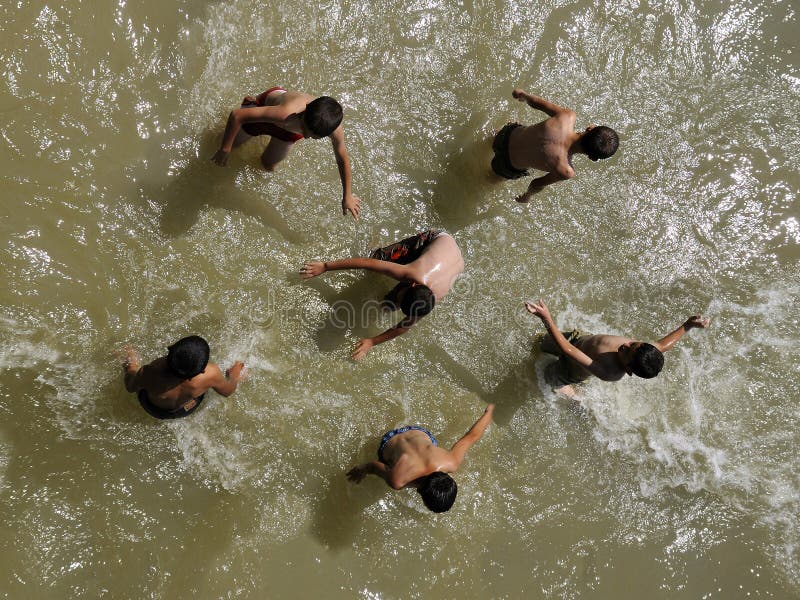 Children who play in the big river meander. Play-province of Denizli, in the village from the river AsagÄ±seyit Sheep Review Contest was held. Starting in the early hours of the morning festivities began in the field of activity within the framework kangal dogs, camels and sheep walk accompanied by the nomad migration was portrayed. Then edit the sheep from the river Competition Review, Denizli-cal, Baklan 38 districts of the shepherd, they paint colorful leader of the herd sheep under the leadership of coach big meander River tried to pass across. Competition across the river with some shepherds of the flock to the late leader of that back by not following some of the shepherds of the flock was observed. date: 31/08/2008. Children who play in the big river meander. Play-province of Denizli, in the village from the river AsagÄ±seyit Sheep Review Contest was held. Starting in the early hours of the morning festivities began in the field of activity within the framework kangal dogs, camels and sheep walk accompanied by the nomad migration was portrayed. Then edit the sheep from the river Competition Review, Denizli-cal, Baklan 38 districts of the shepherd, they paint colorful leader of the herd sheep under the leadership of coach big meander River tried to pass across. Competition across the river with some shepherds of the flock to the late leader of that back by not following some of the shepherds of the flock was observed. date: 31/08/2008