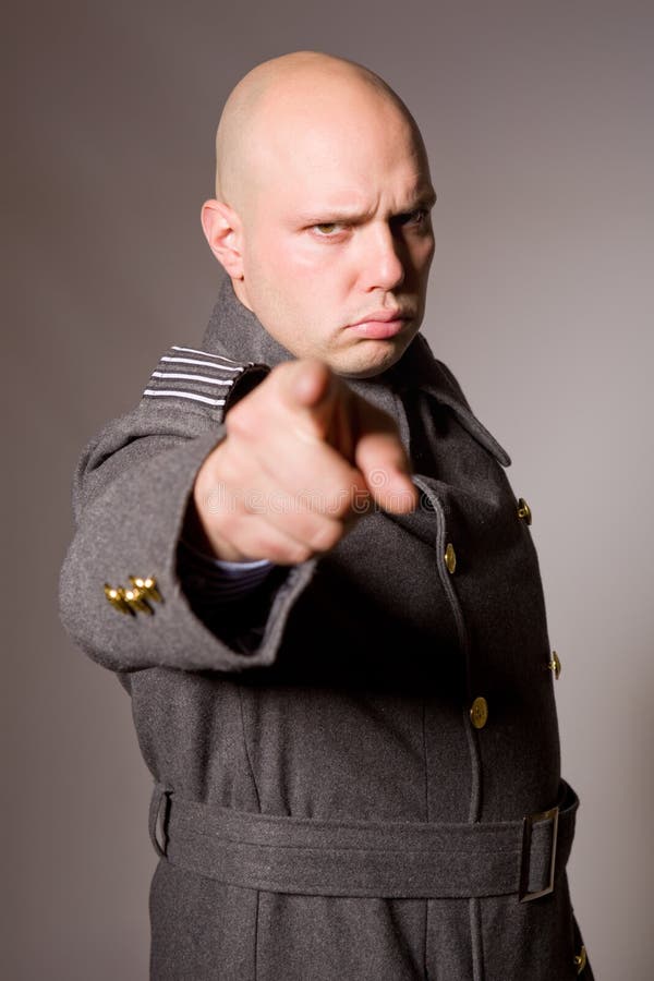 Young man dressed as russian military, studio picture. Young man dressed as russian military, studio picture