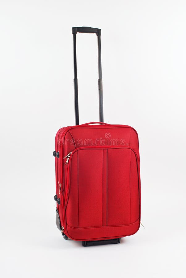Medium red travel Suitcase isolated. Medium red travel Suitcase isolated