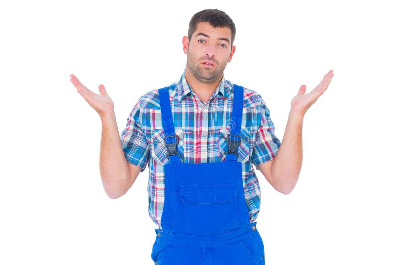 Ταραγμένο handyman δόσιμο δεν ξέρω τη χειρονομία στοκ φωτογραφία με δικαίωμα ελεύθερης χρήσης Ταραγμένο handyman δόσιμο δεν ξέρω τη χειρονομία στοκ φωτογραφία με δικαίωμα ελεύθερης χρήσης