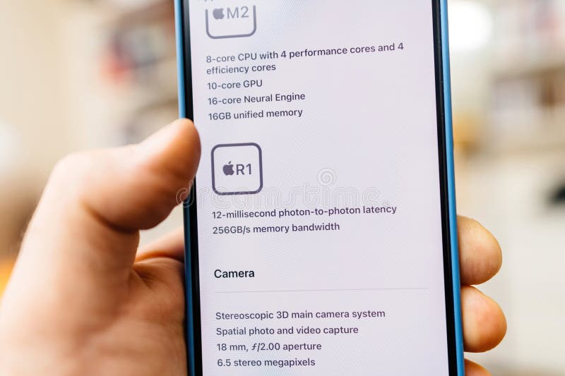 California, USA - Jan 21, 2024: A close-up macro shot of the iPhone 15 Pro reveals the technology behind the Apple Vision Pro mixed reality headset developed by Apple Inc. It features the M2 and R1 CPU GPU, multiple cores, and 16GB unified memory, boasting a 12-millisecond photon-to-photon latency. California, USA - Jan 21, 2024: A close-up macro shot of the iPhone 15 Pro reveals the technology behind the Apple Vision Pro mixed reality headset developed by Apple Inc. It features the M2 and R1 CPU GPU, multiple cores, and 16GB unified memory, boasting a 12-millisecond photon-to-photon latency