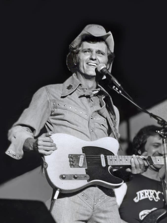 Country music singer, guitarist, and film actor, Jerry Reed, is having a good old time performing at Chicagofest in Chicago, Illinois, in August of 1979. Reed was born in Georgia on March 20, 1937 and died in Nashville, Tennessee on September 1, 2008 at 71. He received a Grammy for performing his hit single, `When You`re Hot, You`re Hot.` Reed was well known for his acting role in `Smokey and the Bandit.`. Country music singer, guitarist, and film actor, Jerry Reed, is having a good old time performing at Chicagofest in Chicago, Illinois, in August of 1979. Reed was born in Georgia on March 20, 1937 and died in Nashville, Tennessee on September 1, 2008 at 71. He received a Grammy for performing his hit single, `When You`re Hot, You`re Hot.` Reed was well known for his acting role in `Smokey and the Bandit.`