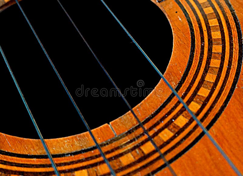 El Cuatro, a typical Venezuelan musical instrument, made of wood and strings, with inlaid wood decorations and tricolor ribbon on its mast, on white background. Key of sun, musical notes, pentagram, sheet music, musical scale, joropo, sound, handmade,. El Cuatro, a typical Venezuelan musical instrument, made of wood and strings, with inlaid wood decorations and tricolor ribbon on its mast, on white background. Key of sun, musical notes, pentagram, sheet music, musical scale, joropo, sound, handmade,