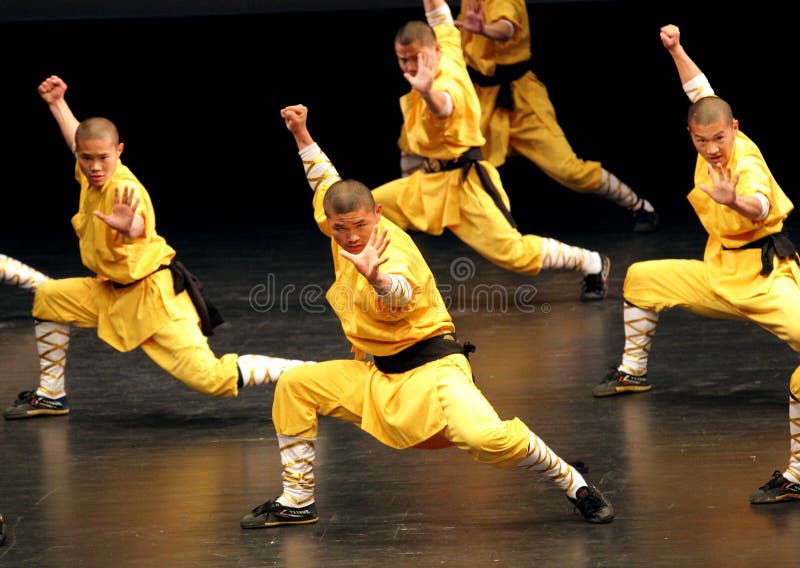 MANAMA, BAHRAIN - MARCH 28: Shaolin Temple group of China performs on March 28, 2012 in Bahrain on the occasion of Seventh Spring of Culture festival. MANAMA, BAHRAIN - MARCH 28: Shaolin Temple group of China performs on March 28, 2012 in Bahrain on the occasion of Seventh Spring of Culture festival