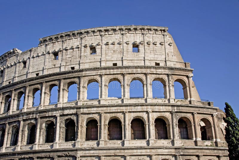 The Colosseum, the world famous landmark in Rome, vertical detail, Italy. The Colosseum, the world famous landmark in Rome, vertical detail, Italy.