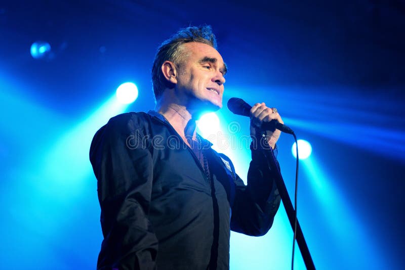 Το Morrissey, το διάσημοι lyricist και ο αοιδός της ορχήστρας ροκ το Smiths, εκτελούν στοκ φωτογραφία με δικαίωμα ελεύθερης χρήσης Το Morrissey, το διάσημοι lyricist και ο αοιδός της ορχήστρας ροκ το Smiths, εκτελούν στοκ φωτογραφία με δικαίωμα ελεύθερης χρήσης