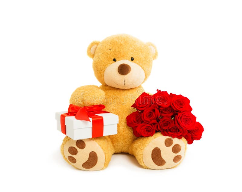Το Teddy αντέχει με το κιβώτιο δώρων και την ανθοδέσμη των κόκκινων τριαντάφυλλων στοκ εικόνες Το Teddy αντέχει με το κιβώτιο δώρων και την ανθοδέσμη των κόκκινων τριαντάφυλλων στοκ εικόνες