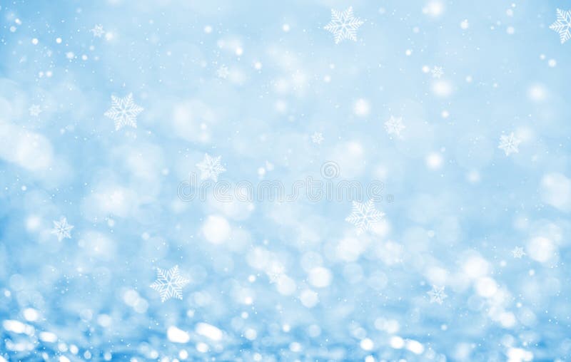 Το αφηρημένο μπλε ακτινοβολεί bokeh και snowflake στοκ φωτογραφία