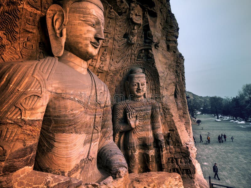 Το βράχος-χαρασμένο Buddhas Yungang Grottoes, Datong, Shanxi, Κίνα στοκ φωτογραφίες Το βράχος-χαρασμένο Buddhas Yungang Grottoes, Datong, Shanxi, Κίνα στοκ φωτογραφίες