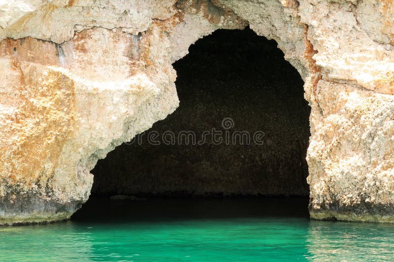 The famous Pirate Cave or Blue Cave on Asirli Island in the Gökkaya Bay close to Demre, Turkey 2022. The famous Pirate Cave or Blue Cave on Asirli Island in the Gökkaya Bay close to Demre, Turkey 2022