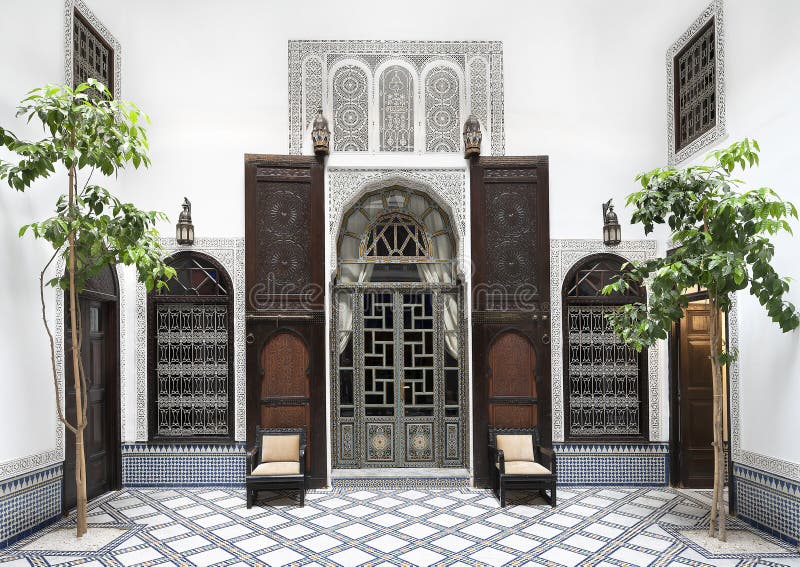 Pictured is the decorative wall of a courtyard in the Riad Maison Bleue, a luxury boutique hotel in Fes, Morocco. The Riad Maison Bleue was created in a house dating from the 19th century whose former owner, was the late Moulay Bel Arbi El Alaoui, famous judge and professor of theology. Today the luxury boutique hotel it is managed by the El Abbadi`s family. Pictured is the decorative wall of a courtyard in the Riad Maison Bleue, a luxury boutique hotel in Fes, Morocco. The Riad Maison Bleue was created in a house dating from the 19th century whose former owner, was the late Moulay Bel Arbi El Alaoui, famous judge and professor of theology. Today the luxury boutique hotel it is managed by the El Abbadi`s family.