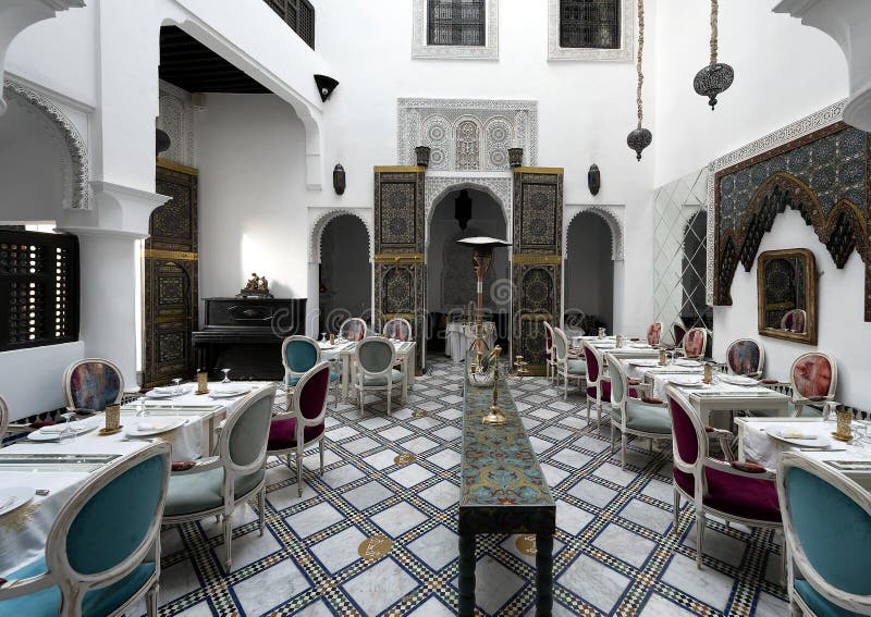 Pictured is the breakfast room of the Riad Maison Bleue, a luxury boutique hotel in Fes, Morocco. The Riad Maison Bleue was created in a house dating from the 19th century whose former owner, was the late Moulay Bel Arbi El Alaoui, famous judge and professor of theology. Today the luxury boutique hotel it is managed by the El Abbadi`s family. Pictured is the breakfast room of the Riad Maison Bleue, a luxury boutique hotel in Fes, Morocco. The Riad Maison Bleue was created in a house dating from the 19th century whose former owner, was the late Moulay Bel Arbi El Alaoui, famous judge and professor of theology. Today the luxury boutique hotel it is managed by the El Abbadi`s family.