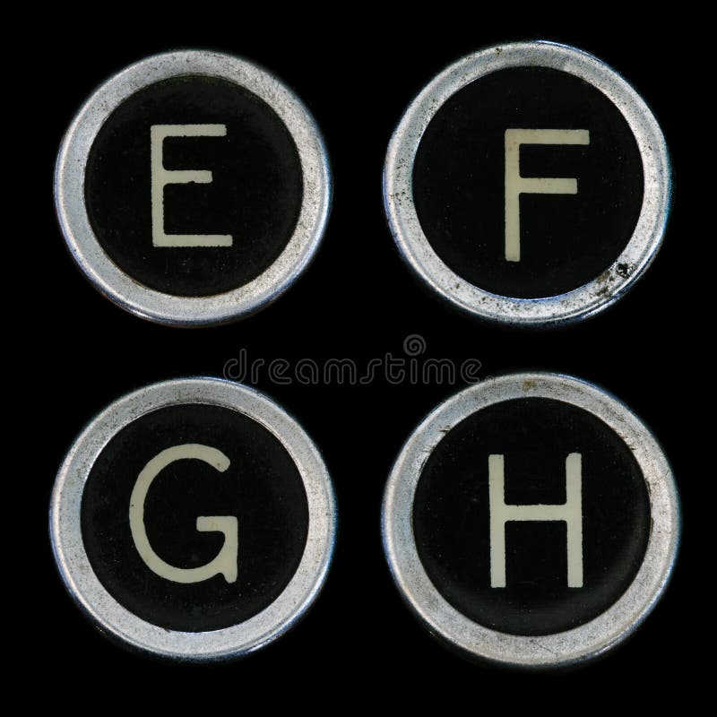 E F G H keys from old typewriter on black background. E F G H keys from old typewriter on black background