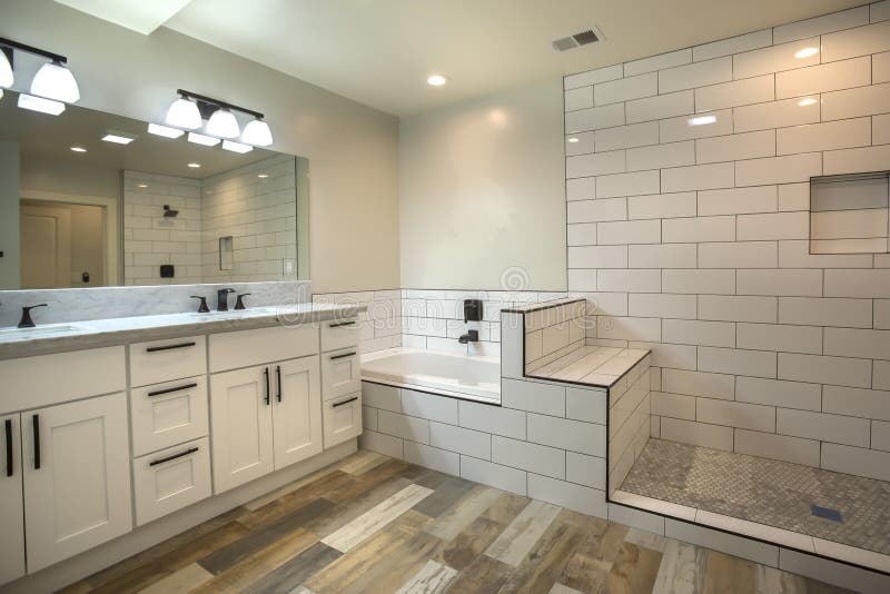 Model homes always show off beautiful bathrooms with clever design. Model homes always show off beautiful bathrooms with clever design