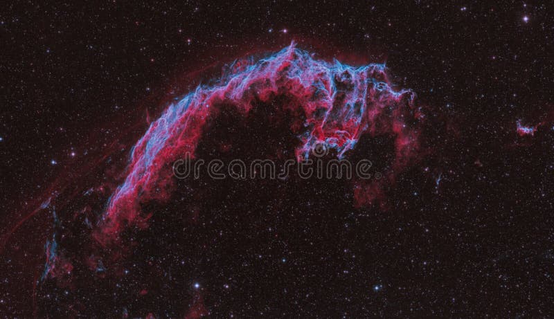 Widefield view of the Eastern Veil Nebula supernova remnant of ionized gas clouds. Located in the constellation Cynus, The Swan. Image done in bi-color palette of Hydrogen-Alpa and Oxygen-III. Widefield view of the Eastern Veil Nebula supernova remnant of ionized gas clouds. Located in the constellation Cynus, The Swan. Image done in bi-color palette of Hydrogen-Alpa and Oxygen-III.