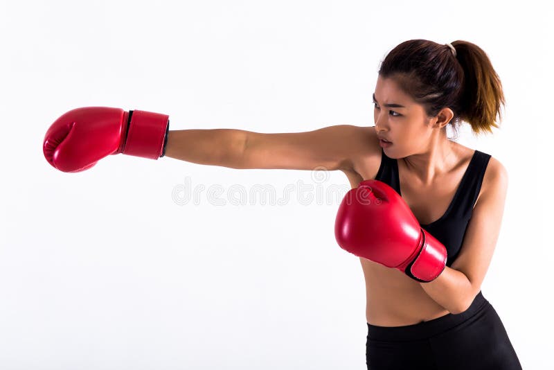 Το πορτρέτο νέο θηλυκό punching μπόξερ στο λευκό απομόνωσε το υπόβαθρο με το διάστημα αντιγράφων στοκ φωτογραφία με δικαίωμα ελεύθερης χρήσης Το πορτρέτο νέο θηλυκό punching μπόξερ στο λευκό απομόνωσε το υπόβαθρο με το διάστημα αντιγράφων στοκ φωτογραφία με δικαίωμα ελεύθερης χρήσης