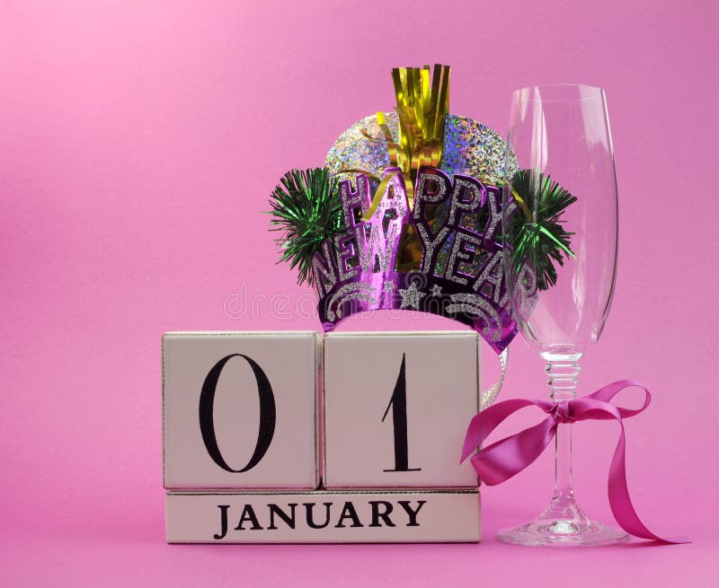 Pink theme Save the date with a Happy New Year, January 1, block calendar, with champagne glass and party hat. Pink theme Save the date with a Happy New Year, January 1, block calendar, with champagne glass and party hat.