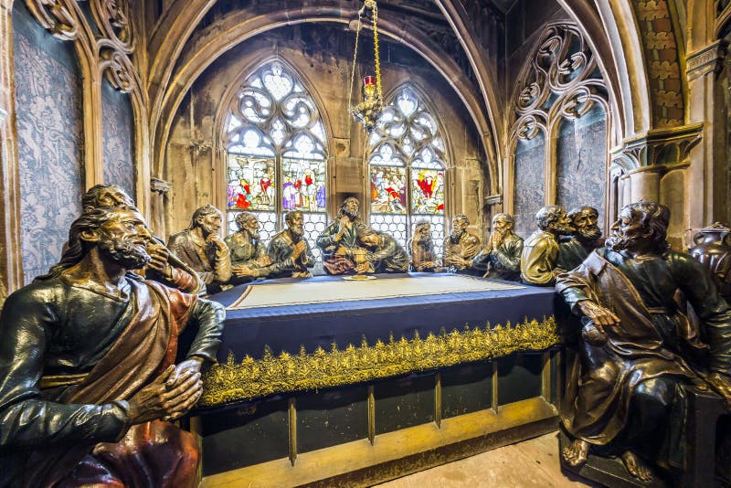 FREIBURG, GERMANY - JULY 4, 2013: The last supper in the Freiburg Minster. Famous life-sized wooden figures by sculptor Franz Anton Xaver Hauser. FREIBURG, GERMANY - JULY 4, 2013: The last supper in the Freiburg Minster. Famous life-sized wooden figures by sculptor Franz Anton Xaver Hauser.