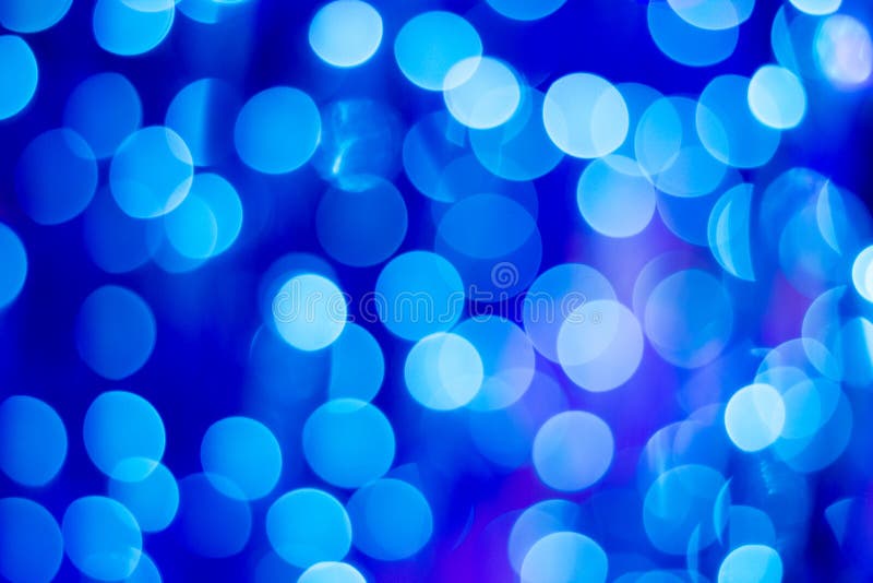 Το φωτεινό λαμπρό μπλε bokeh ανάβει το υπόβαθρο για το greeti εορτασμού στοκ φωτογραφία με δικαίωμα ελεύθερης χρήσης Το φωτεινό λαμπρό μπλε bokeh ανάβει το υπόβαθρο για το greeti εορτασμού στοκ φωτογραφία με δικαίωμα ελεύθερης χρήσης