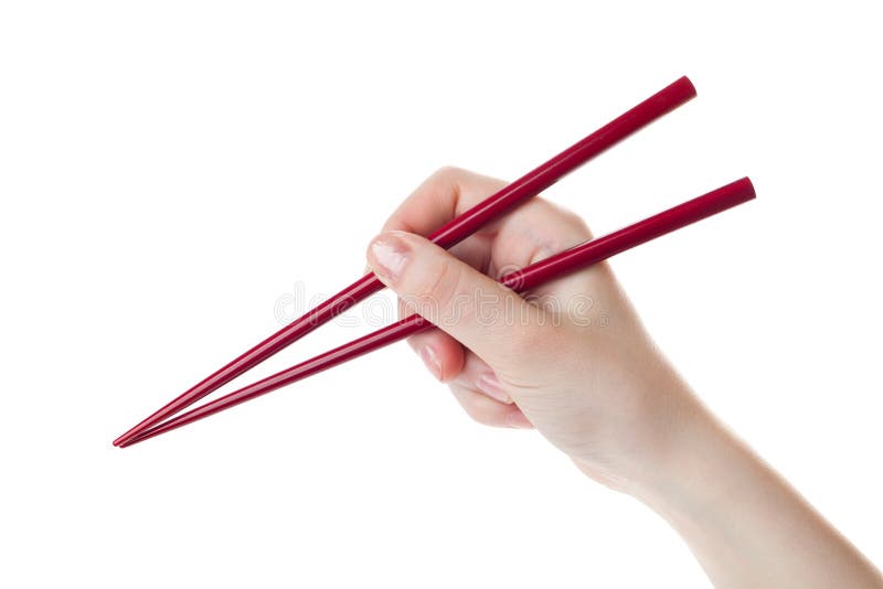 Το χέρι κρατά chopsticks στοκ εικόνα με δικαίωμα ελεύθερης χρήσης